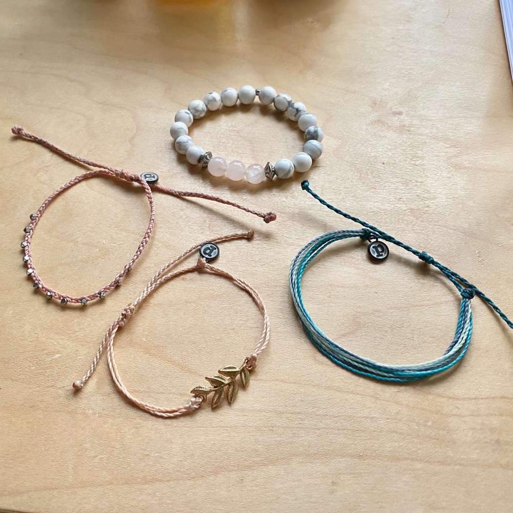 3 bracelets/ 1 anklet (some puravida)